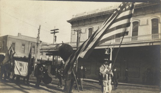 Chico funeral procession with American flag copy